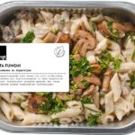 Pasta funghi met roomsaus en doperwtjes